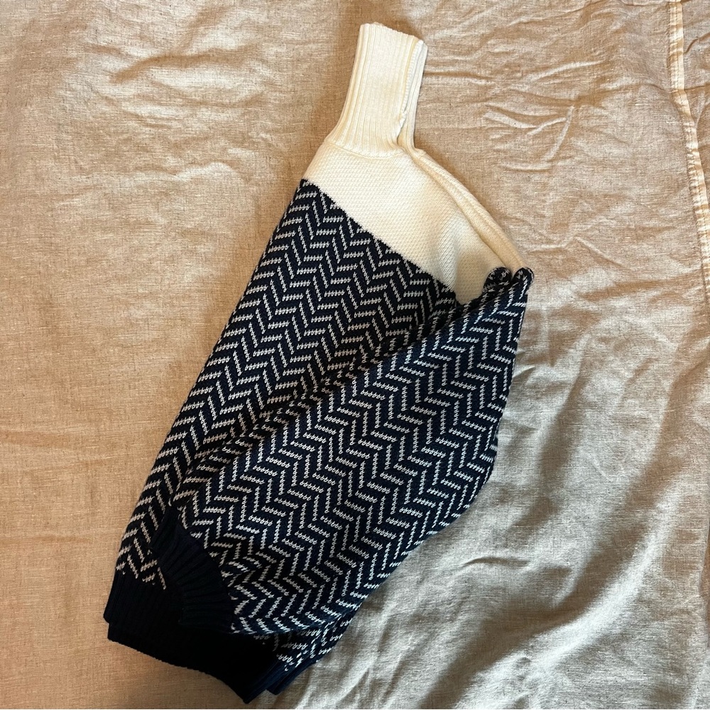 Chunky white and navy turtleneck sweater